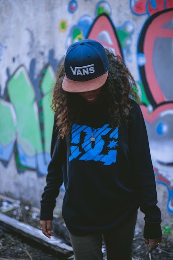 Photo of Person Wearing Vans Cap