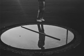 Photo Of Person Wearing White Shoes
