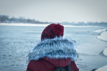 Photo of Person Wearing Winter Clothes