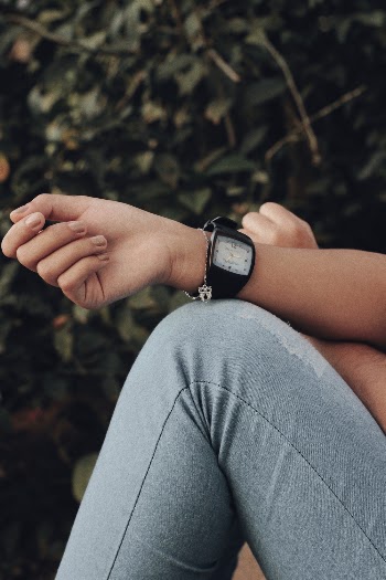 Photo of Person Wearing Wristwatch