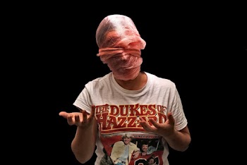 Photo of Person Wrapped With Plastic Mask