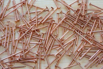 Photo of Pile Of Copper Nails