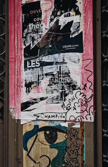 Photo Of Posters on Wall