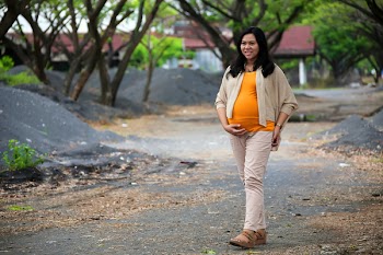 Photo of Pregnant Woman Walking on Pathway