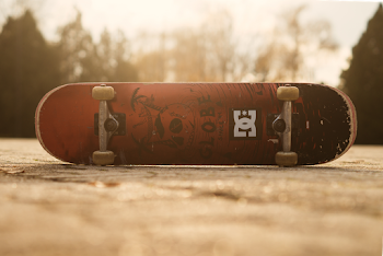Photo of Red and Black Skateboard