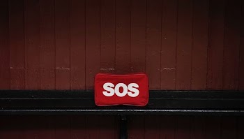 photo of red and white SOS decor