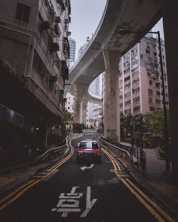 Photo Of Red Vehicle On Road