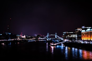 Photo of River Near City Buildings