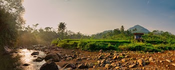 Photo of River Near Rocks and Stones