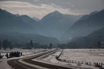 photo of road towards mountains