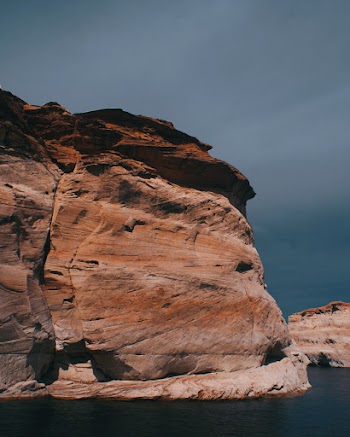 Photo of Rock Formation Near Water
