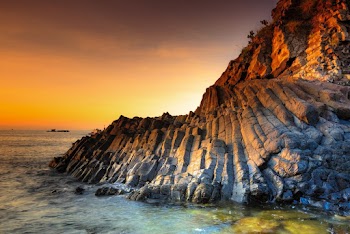 Photo of Rock Formation On Ocean