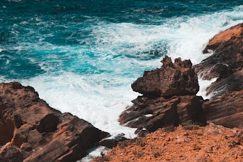 Photo of Rocks Formation on Seashore