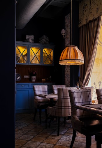 Photo of Room With Orange Pendant Lamp