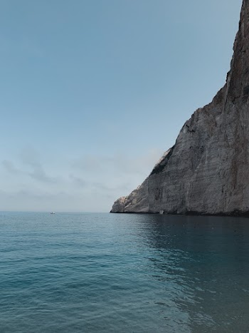 Photo of Sea by Mountain