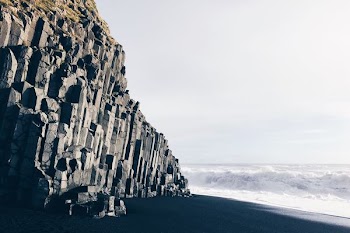 photo of sea waves on shore