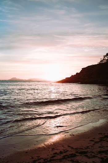 Photo Of Seashore During Dawn