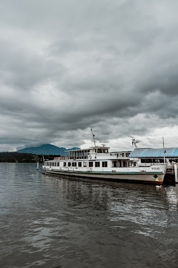 Photo of Ship Under Cloudy Sky