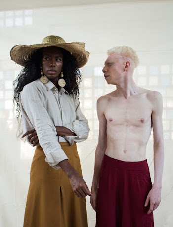 Photo Of Shirtless Man And A Woman