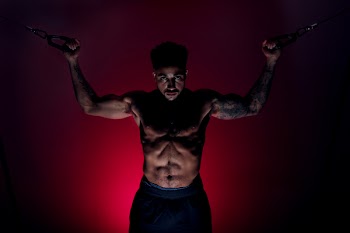 Photo of Shirtless Man With Tattoo