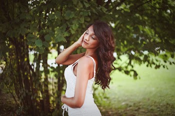 Photo Of Side View Woman Holding Her Stomach And Face