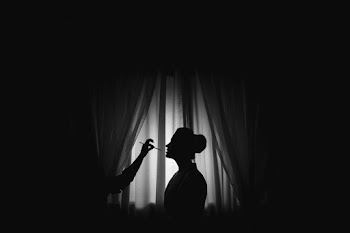 Photo Of Silhouette Person Near Window