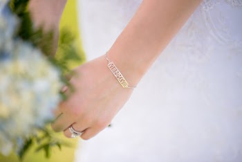 Photo of Silver Bracelet on Her Wrist