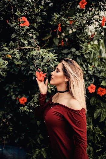 Photo of Smelling Hibiscus Flower
