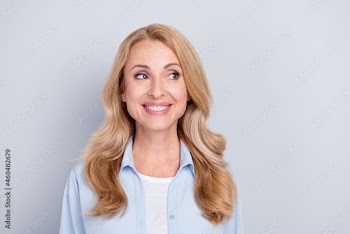 Photo of smiling good mood thoughtful girl look copyspace see sale discount black friday isolated on grey color background