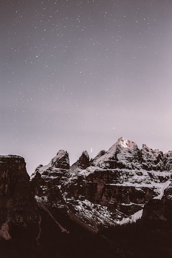 Photo of Snow Capped Mountain During Evening