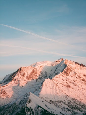 Photo of Snow Capped Mountain Under Blue Sky