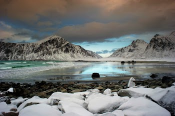 Photo Of Snow Capped Mountains During Dawn 