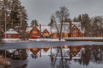 photo of snow covering house roof