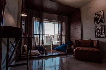 photo of sofa near window