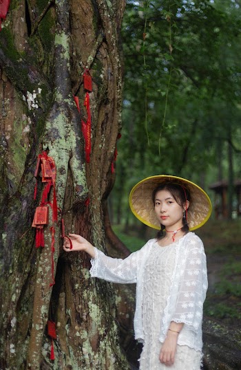 Photo Of Standing Near Tree