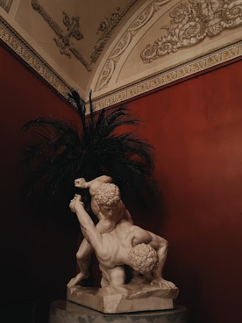 Photo Of Statue Beside Plant