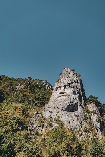 Photo of Stone Sculpture on Mountain