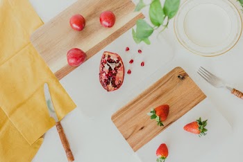 Photo Of Strawberries On Top Of Wooden Chopping Board