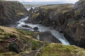 Photo of Stream of River in Between Cliff