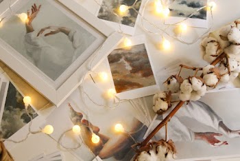 Photo Of String Lights On Top Of Pictures