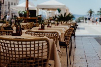 Photo Of Tables And Chairs During Daytime 