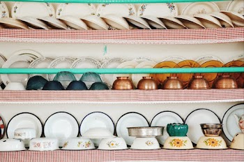 Photo of Tableware Sets on a Rack