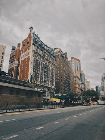 Photo of Tall Buildings Near Road