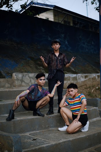 Photo of Three Men on Stairs
