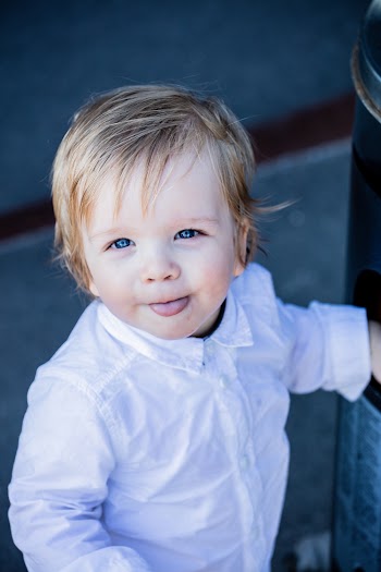 Photo Of Toddler Sticking His Tongue Out