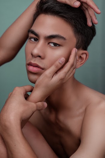 Photo of Topless Man Looking