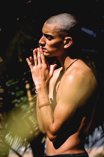 Photo of Topless Man Standing