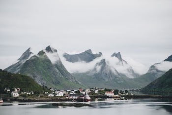 photo of town near mountains