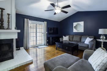Photo of Turned-on Ceiling Fan With Fixture Light