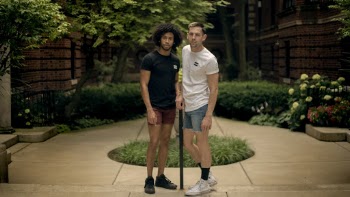 Photo Of Two Men Standing Beside Each Other